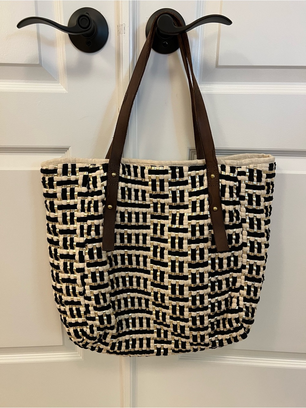 Woven Black, Cream, and Gold Tote Bag with Brown Leather Handles